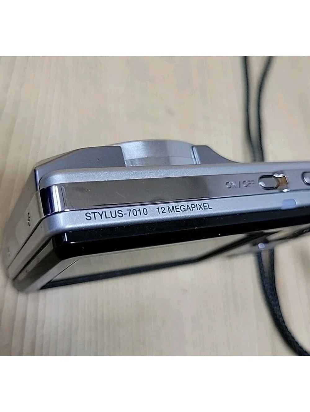 Olympus Stylus 7010 12.0MP Silver Digital Camera with Charger NO SD CARD WORKS!